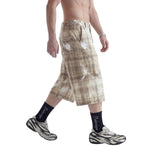 Bermudas vaqueras rasgadas con parches de camuflaje