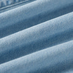 Vestido midi vaquero sin mangas con botones y aberturas en la parte delantera