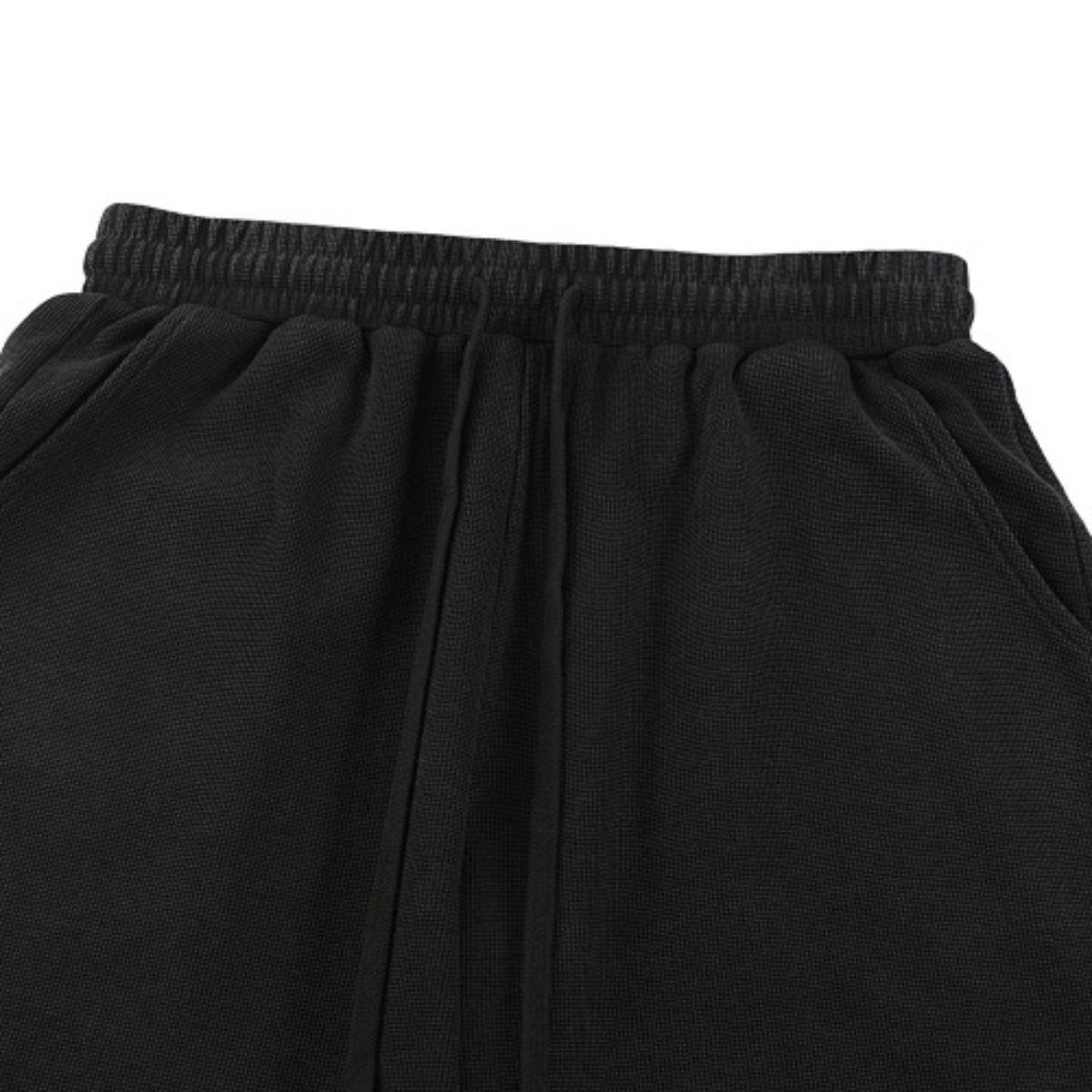 Bermudas con lavado vintage y salpicaduras de tinta