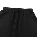 Bermudas con lavado vintage y salpicaduras de tinta