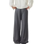 Pantalones anchos plisados