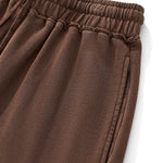 Pantalones cortos relajados con bordes sin rematar y lavados