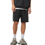 Pantalones cortos relajados con bordes sin rematar y lavados