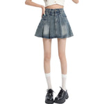 High-Rise Pleated Denim Mini Skirt
