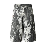 Bermudas de mezclilla desgastada con estampado de salpicaduras