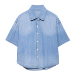 Vestido midi vaquero sin mangas con botones y aberturas en la parte delantera