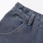 Bermudas vaqueras rasgadas con parches de camuflaje