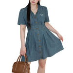 Minivestido vaquero con corsé bordado con lazo