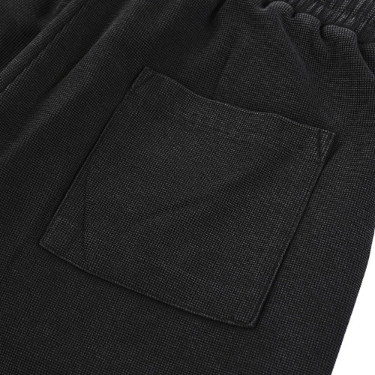 Bermudas con lavado vintage y salpicaduras de tinta