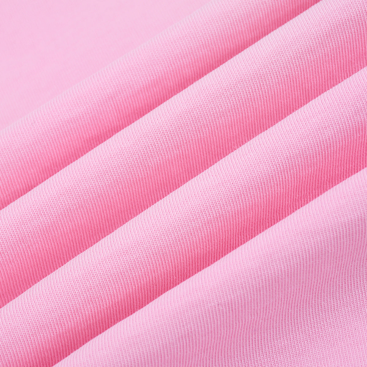 Camiseta rosa lavada a la piedra para mujer de 7.5 oz