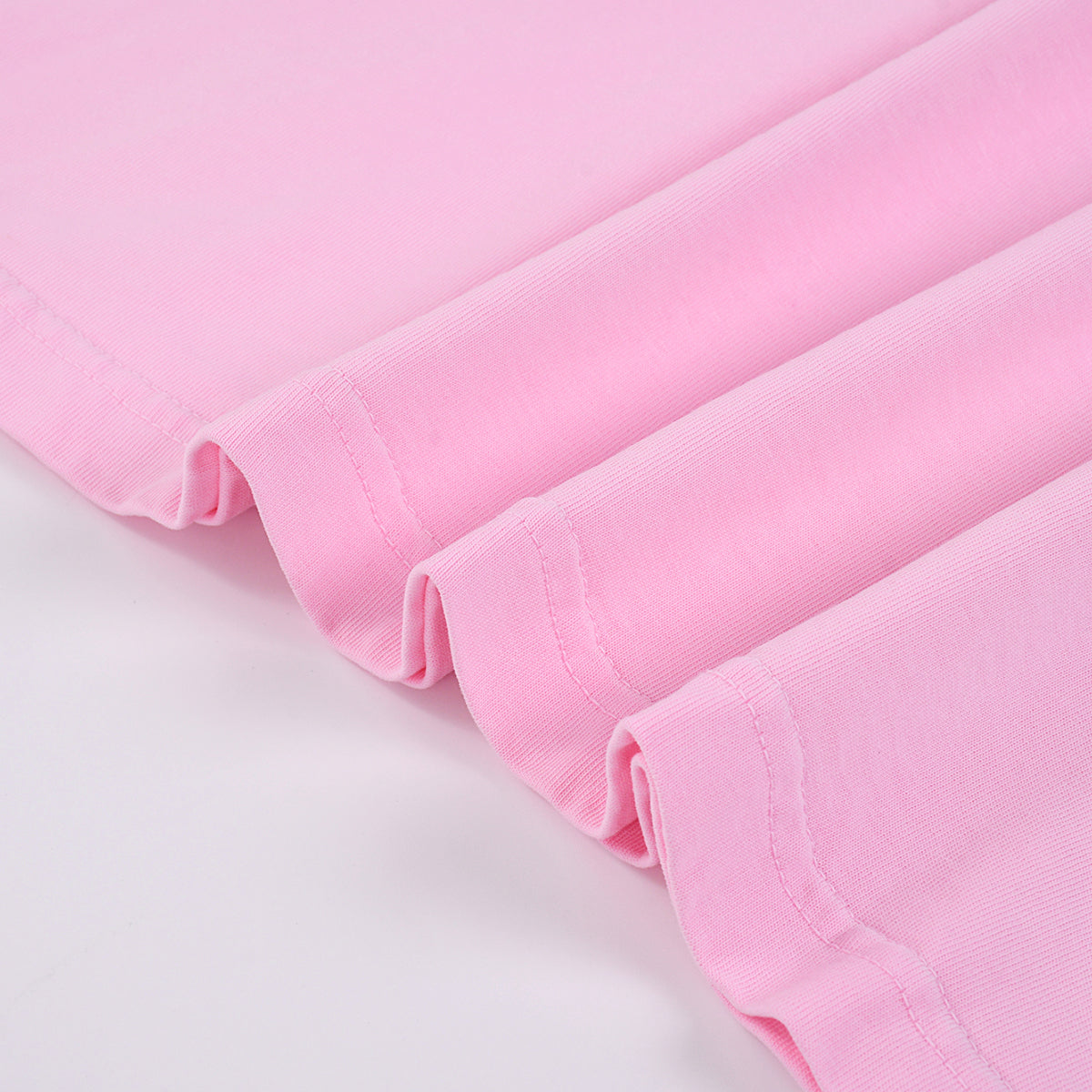 Camiseta rosa lavada a la piedra para mujer de 7.5 oz