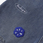 Bermudas vaqueras rasgadas con parches de camuflaje