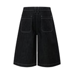 Bermudas con lavado vintage y salpicaduras de tinta
