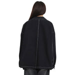 Vestido midi vaquero sin mangas con botones y aberturas en la parte delantera