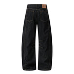 Raw Black Deconstructed Curved Wide‑Leg Jeans