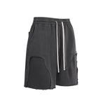 Pantalones cortos deportivos con bordes sin rematar y lavados a la piedra