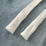 Bermudas vaqueras rasgadas con parches de camuflaje