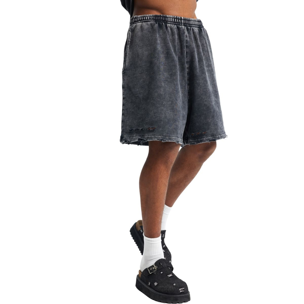 Pantalones cortos desgastados con lavado a la piedra