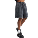 Pantalones cortos desgastados con lavado a la piedra