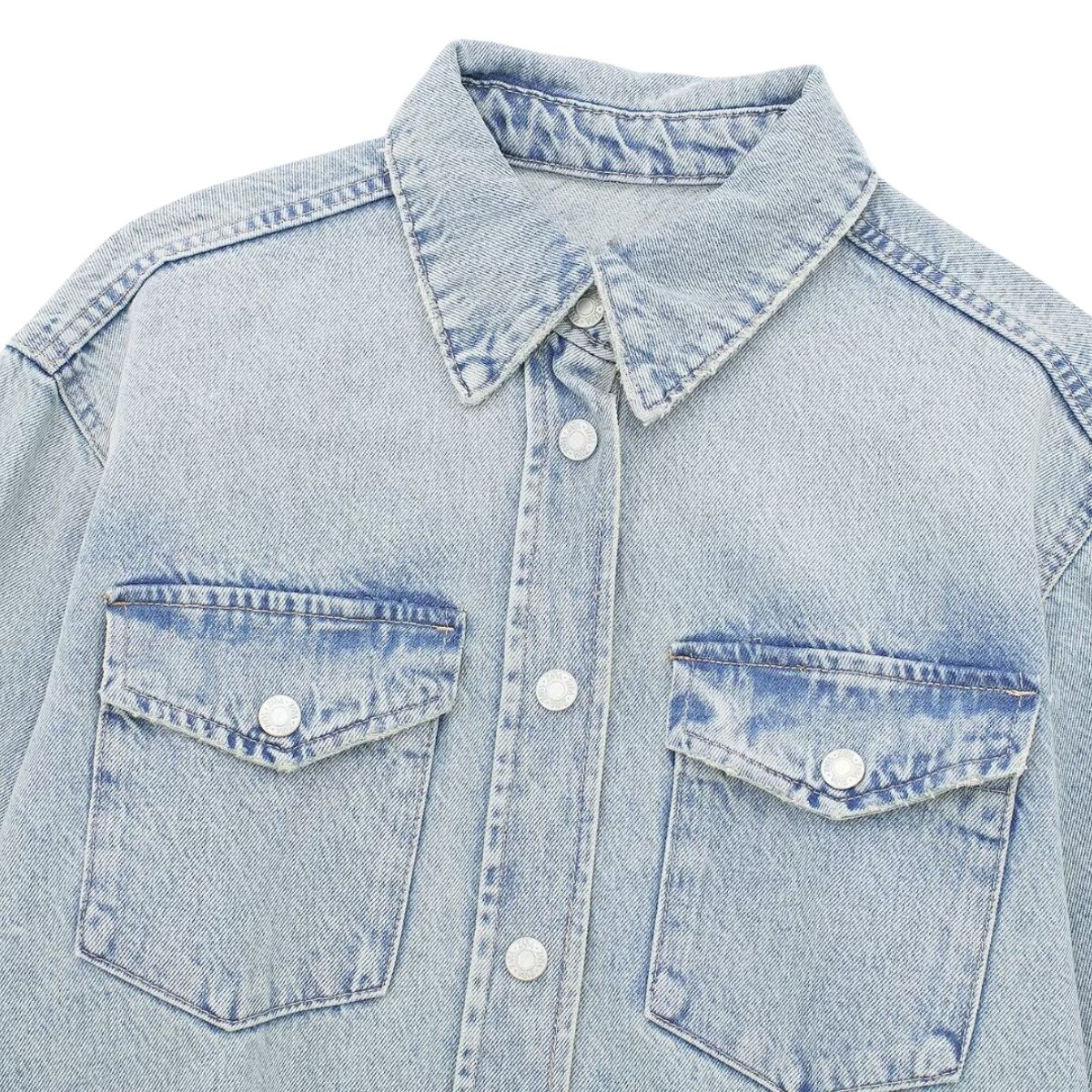 Vestido midi vaquero sin mangas con botones y aberturas en la parte delantera