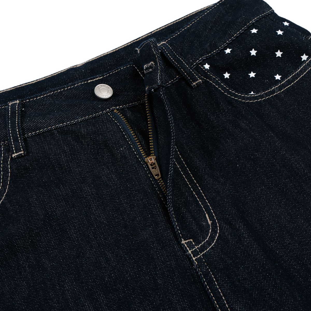 Star‑Print Curved Blade Raw Denim Jeans