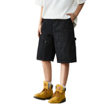 Bermudas con lavado vintage y salpicaduras de tinta
