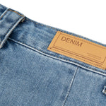 Falda vaquera con bordado de perlas y lavado vintage