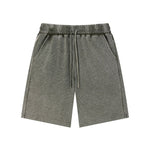 Bermudas con lavado vintage y salpicaduras de tinta