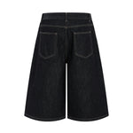 Bermudas con lavado vintage y salpicaduras de tinta