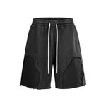 Pantalones cortos deportivos con bordes sin rematar y lavados a la piedra