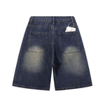 Bermudas con lavado vintage y salpicaduras de tinta