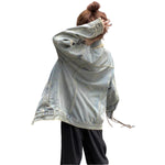 Vestido midi vaquero sin mangas con botones y aberturas en la parte delantera