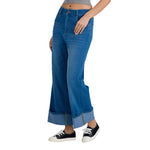 Mid Rise Rolled Hem Slimming Knit Denim Straight Leg Jeans