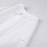 Camiseta de algodón de color liso y corte relajado de 6,6 oz