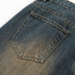 Bermudas vaqueras rasgadas con parches de camuflaje