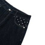 Star‑Print Curved Blade Raw Denim Jeans