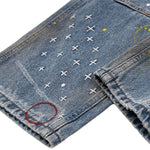 Pantalones vaqueros holgados con estampado de serpiente