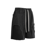 Pantalones cortos deportivos con bordes sin rematar y lavados a la piedra