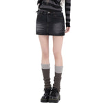 Falda vaquera con bordado de perlas y lavado vintage