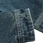 Vestido midi vaquero sin mangas con botones y aberturas en la parte delantera