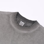 Camiseta sin mangas con borde sin rematar y costura trasera de 7.5 oz