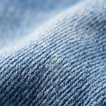 Mid Rise Rolled Hem Slimming Knit Denim Straight Leg Jeans