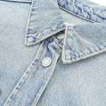 Vestido midi vaquero sin mangas con botones y aberturas en la parte delantera