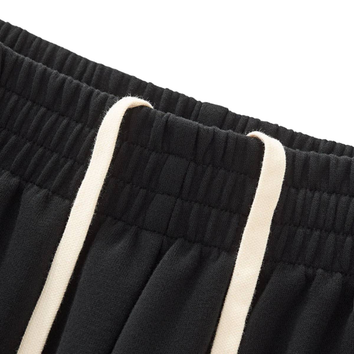 Pantalones deportivos holgados de color gris oscuro