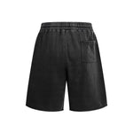 Pantalones cortos deportivos con bordes sin rematar y lavados a la piedra