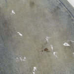 Bermudas con lavado vintage y salpicaduras de tinta