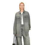 Vestido midi vaquero sin mangas con botones y aberturas en la parte delantera