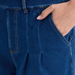 Mid Rise Rolled Hem Slimming Knit Denim Straight Leg Jeans