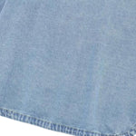 Vestido midi vaquero sin mangas con botones y aberturas en la parte delantera