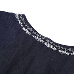 Falda vaquera con bordado de perlas y lavado vintage